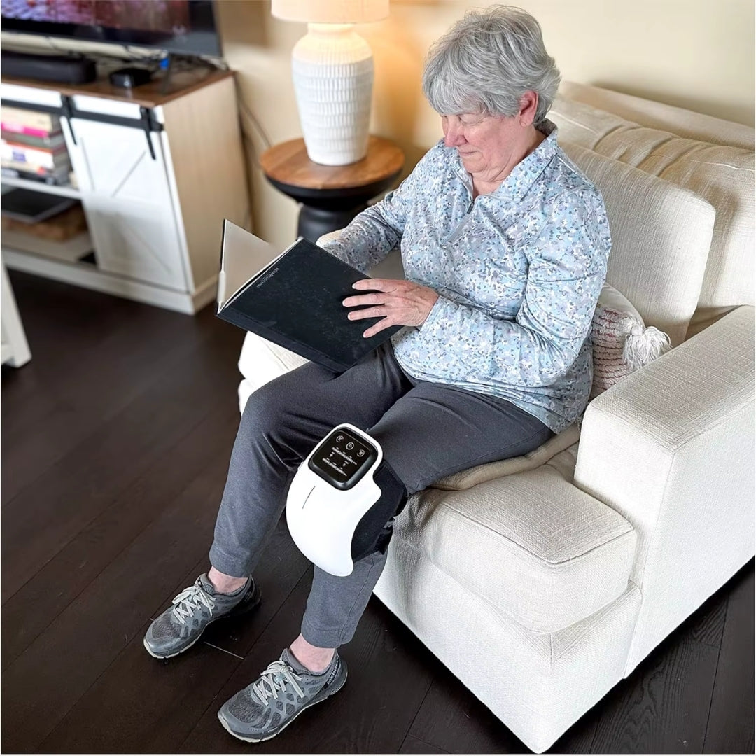 Woman using the AuraKnee Pro during a ten-minute session at home